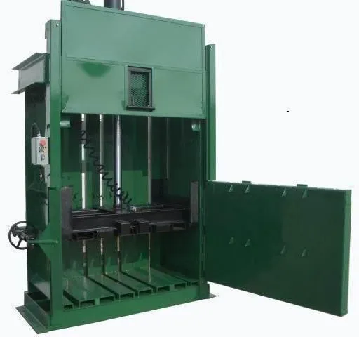 Green vertical waste baler with open door